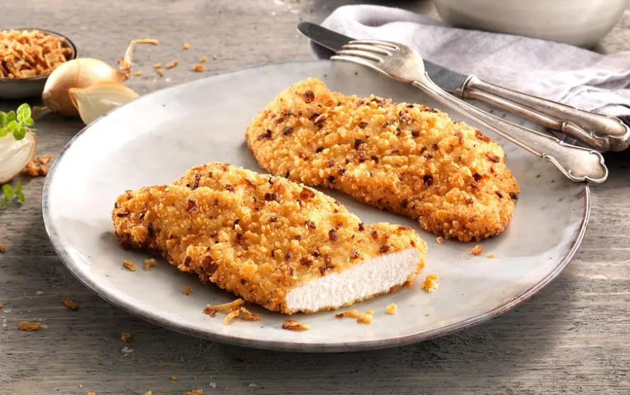 Kipschnitzels met gebakken uitjes