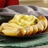 Witte pens met appelpartjes en aardappelpuree